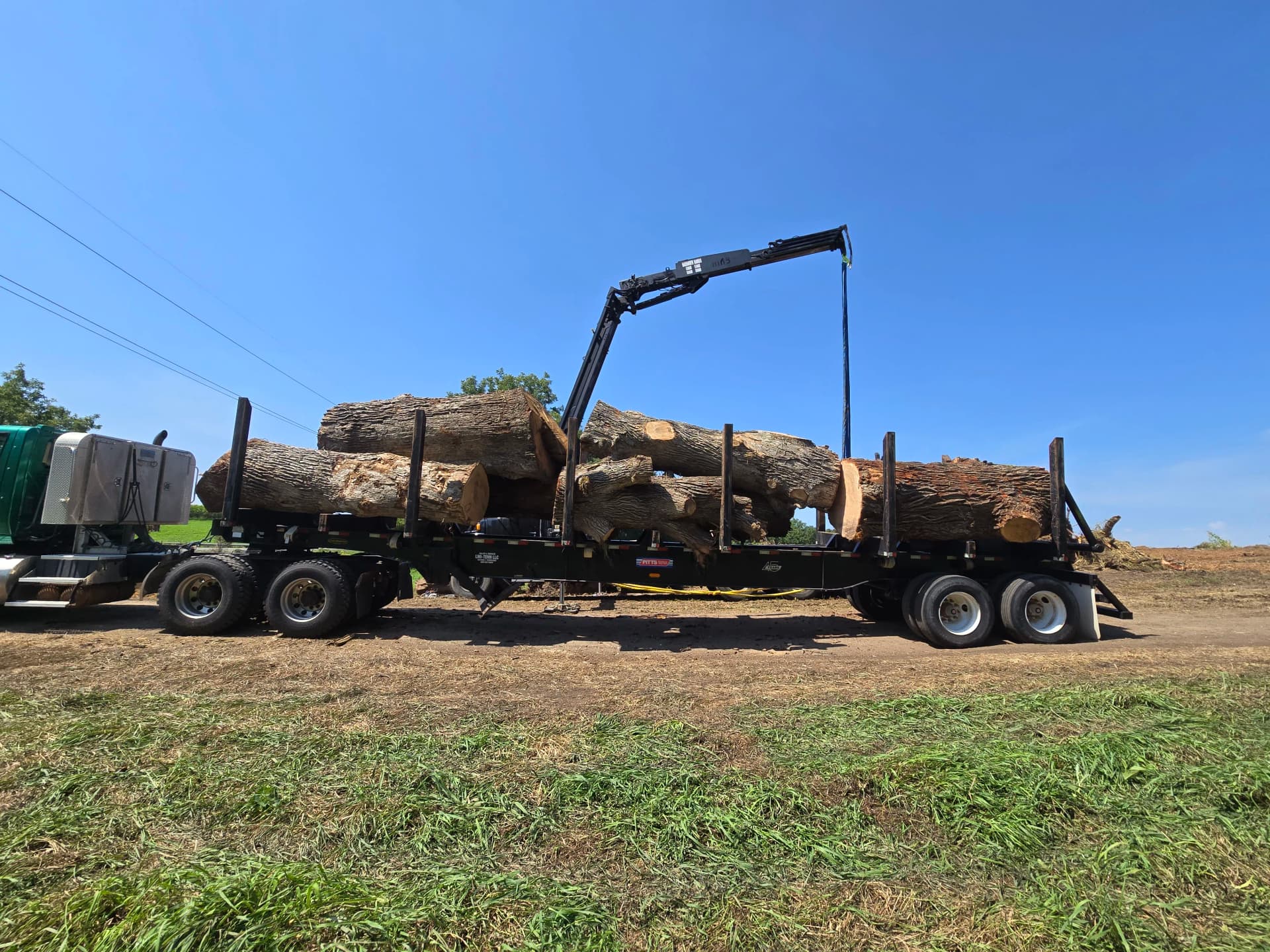 Heavy Log Hauling for a Solar Farm in Galesburg image
